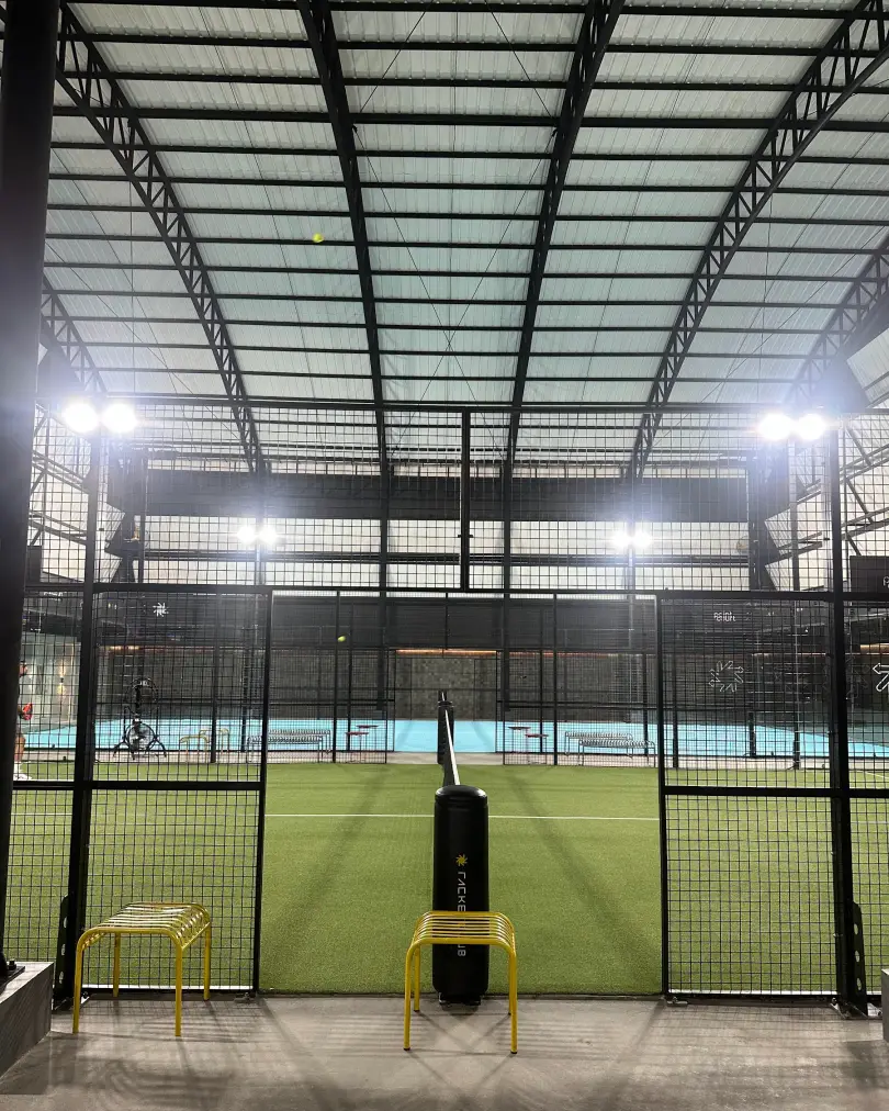 The green padel court at night